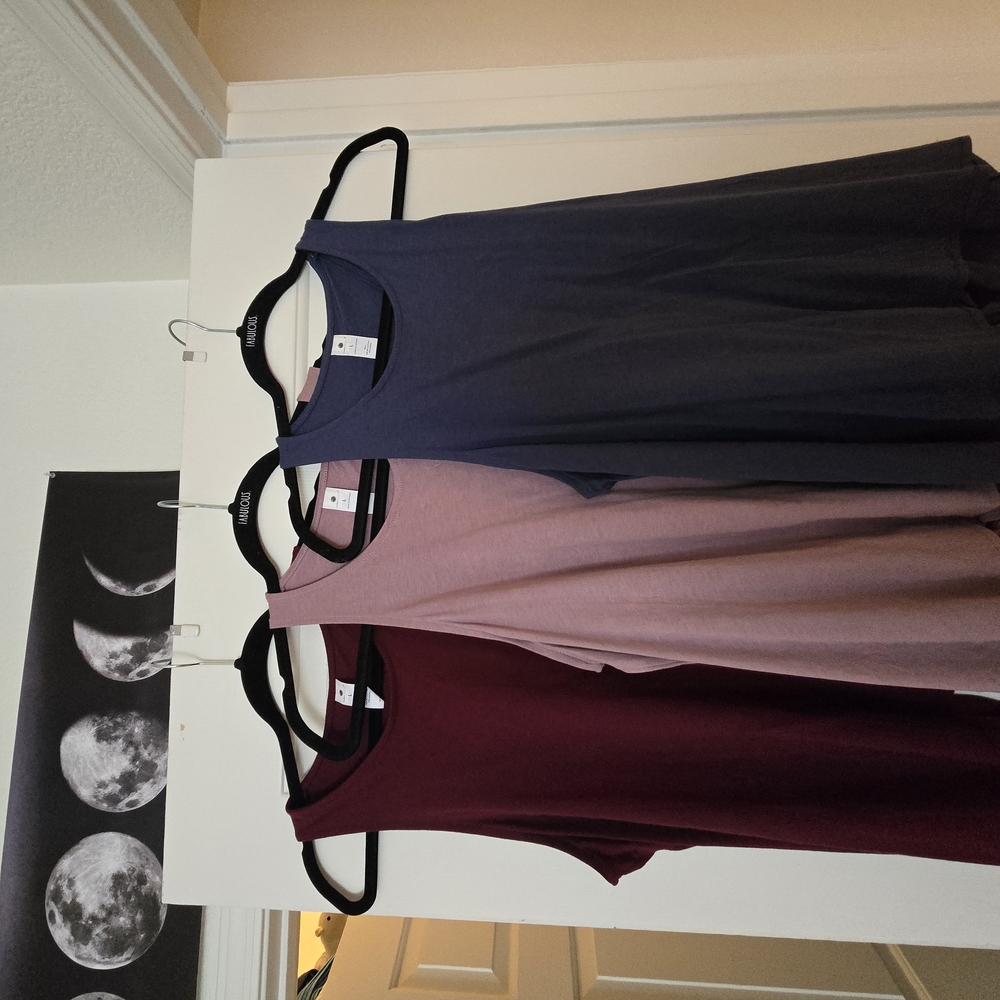 Set of Three Sleeveless Yoga Tops in Blue, Pink, and Burgundy